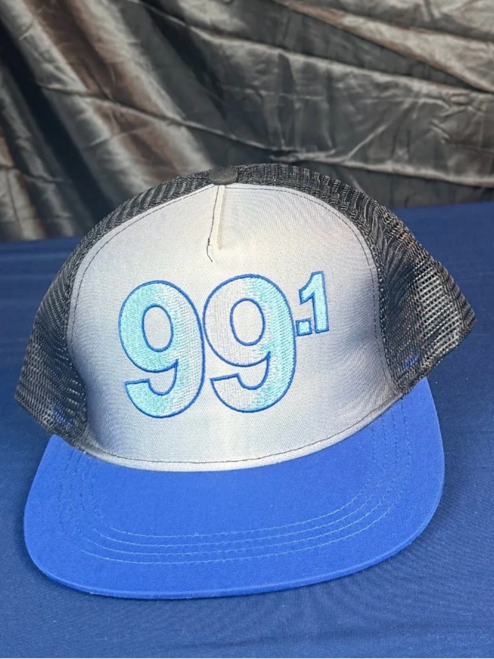 99.1 Embroidered Trucker Hat in Gray and Blue